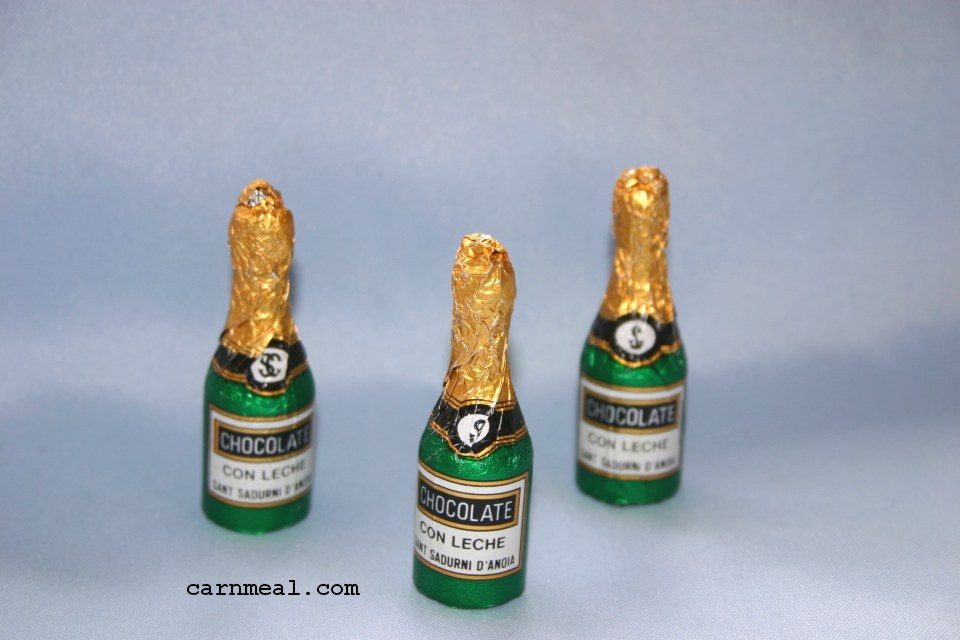 A chocolate miniature champagne bottle 65mm high Will fit favour box